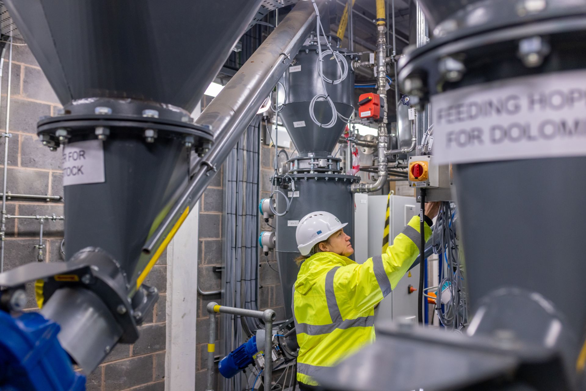 A researcher working at Aston University's Energy and Bioproducts Research Institute